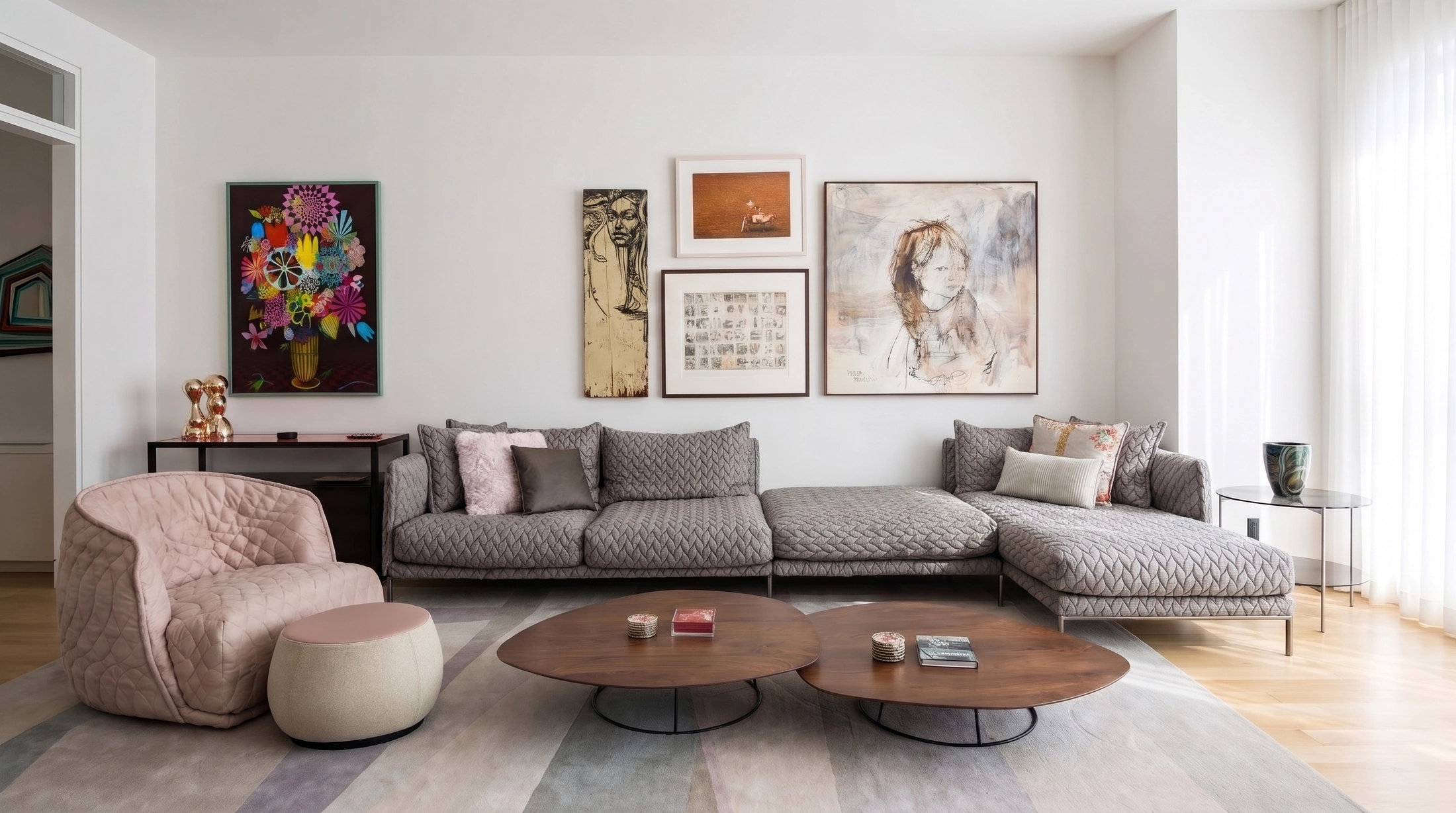 Broadway Penthouse living room with art wall and sculptural furniture