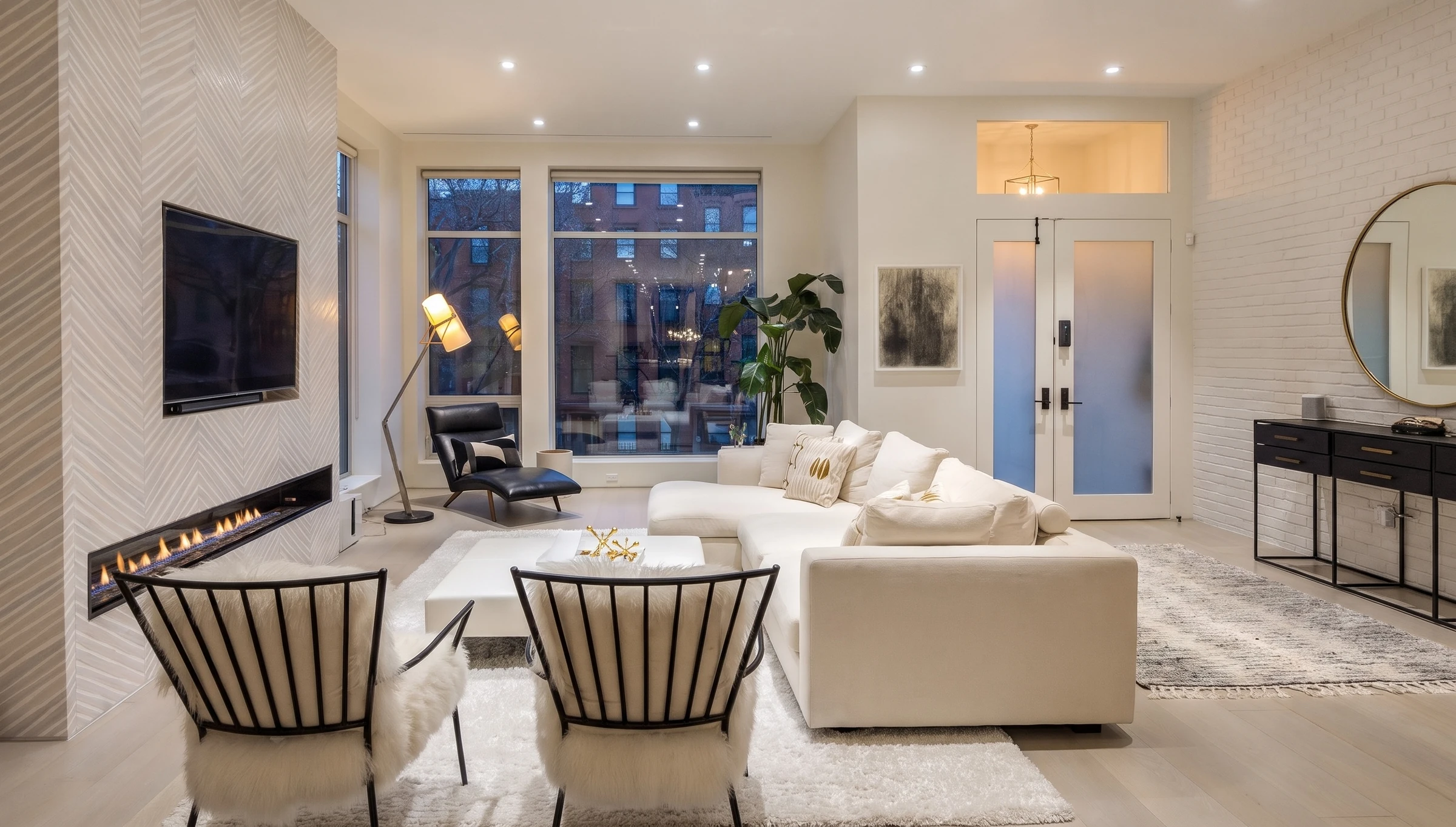 Clinton Hill Townhouse living room with white sofa and fireplace