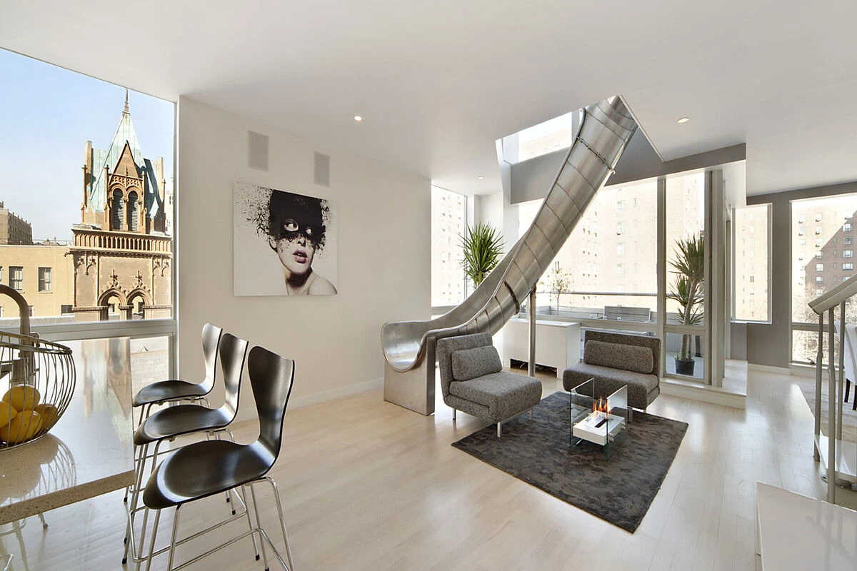 East Village Penthouse living room with a sculptural steel slide