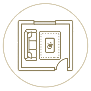 Top-down floor plan with sofa, rug, coffee table, and doorway