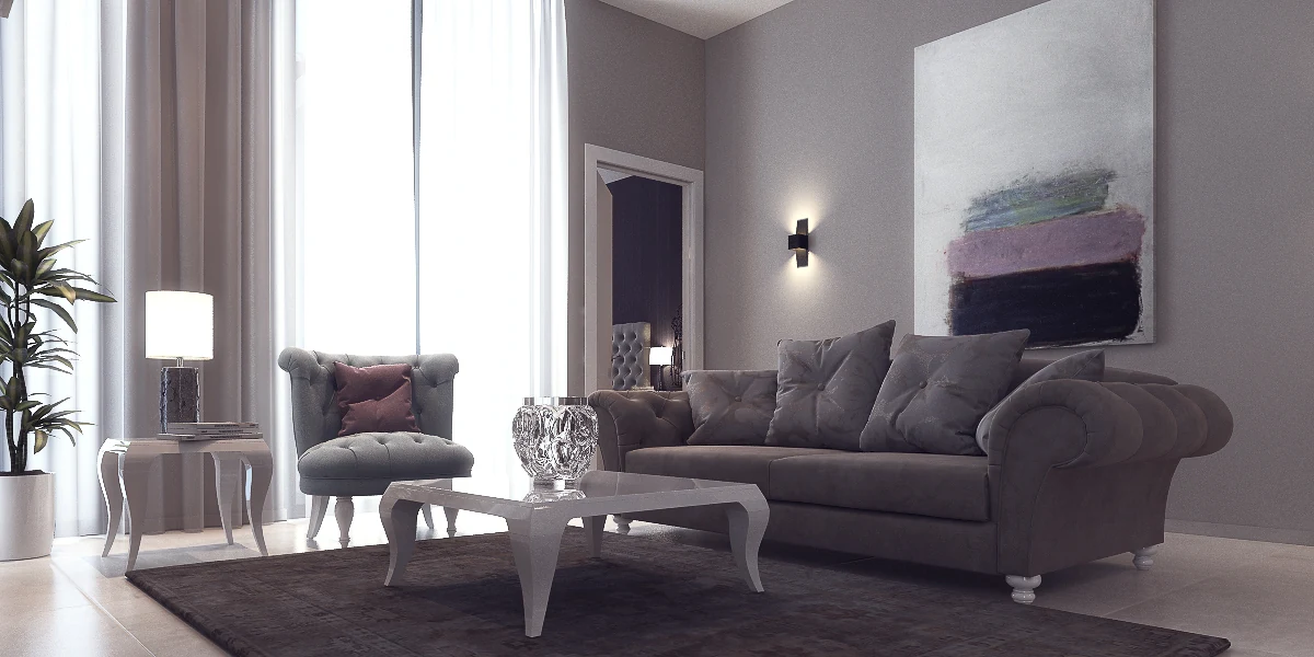 The Icon Residence living room concept with a tufted gray sofa and tall windows