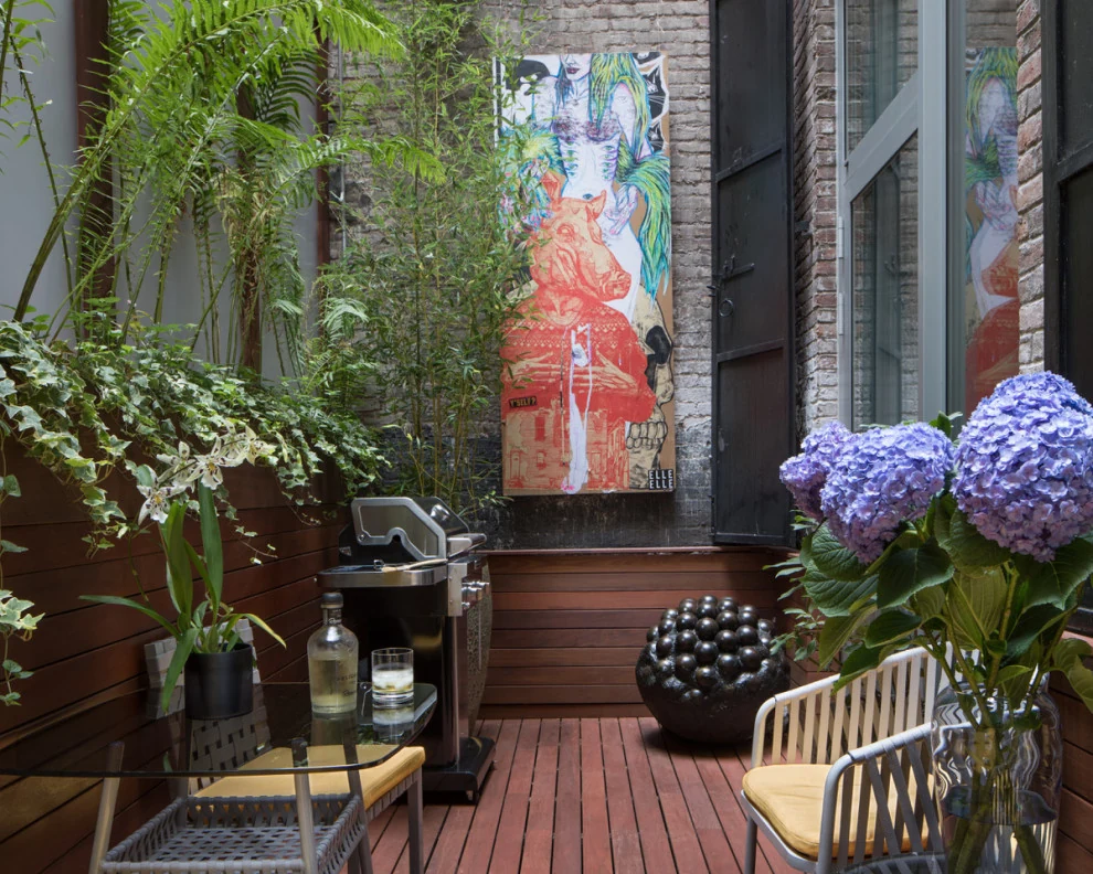 Tribeca Loft planted terrace with mural and hydrangeas
